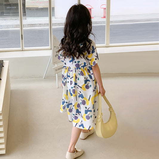 kid girl wearing a one piece dress with colourful print