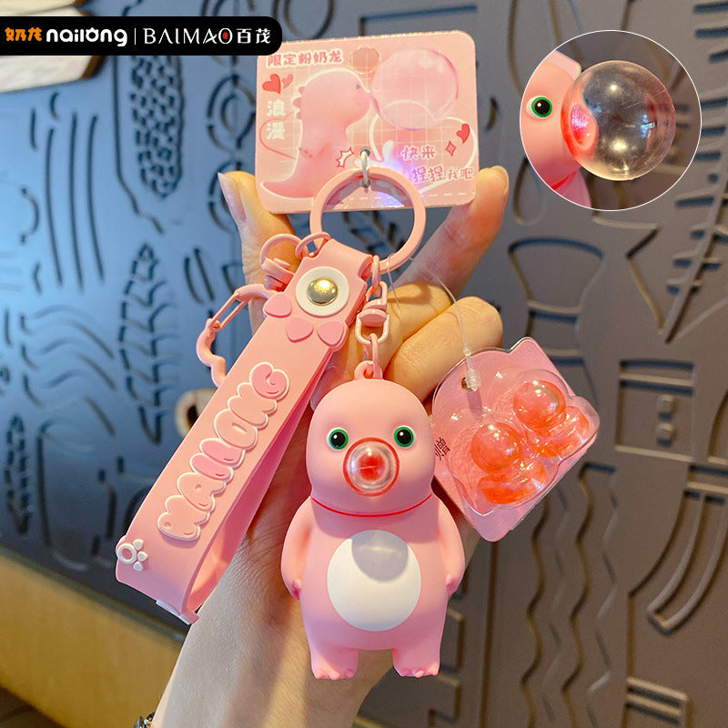 Stress relieving Bubble Blowing Milk Dragon Pink Keychain Cute and Exquisite Doll for Women and Men Stress relieving Toy Bag Pendant