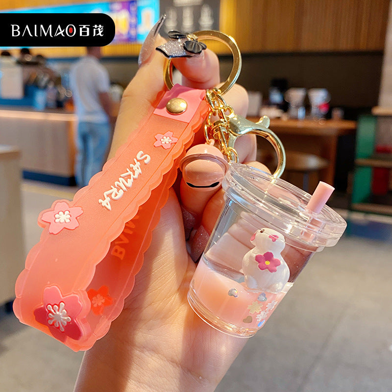 Cartoon acrylic oil immersed floating rabbit keychain, cute female creative car keychain, bag pendant