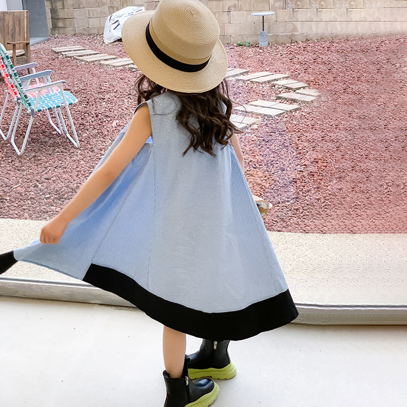 kid girl in blue sleeveless dress with boots