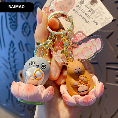 Buddha style Good Luck Lotus Lotus Series Wooden Fish Three Flower Cat Pig Pig Keychain Exquisite Resin Doll Keychain Ring