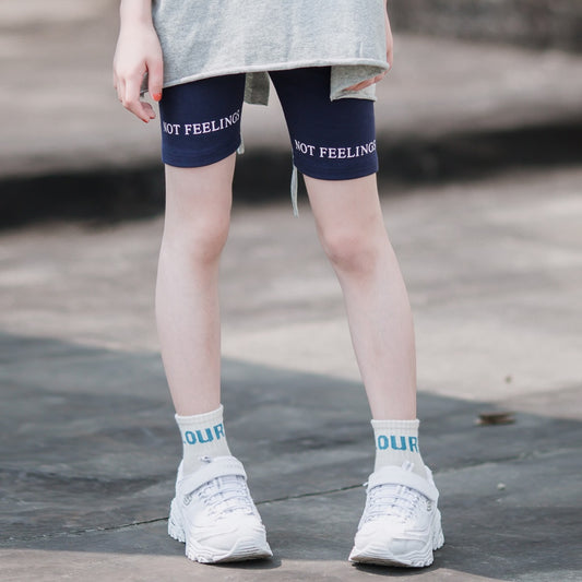 kid girl blue shorts with sneakers